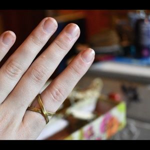 Golden crisscrossed ring